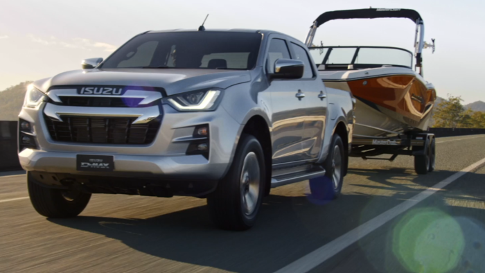 Brisbane-based Peachy Keen Colourist Angela Cerasi colour graded this shot of a silver ute, towing a boat on a trailer, driving down a highway, for the "Ute - Aftersales" campaign commercial for Isuzu