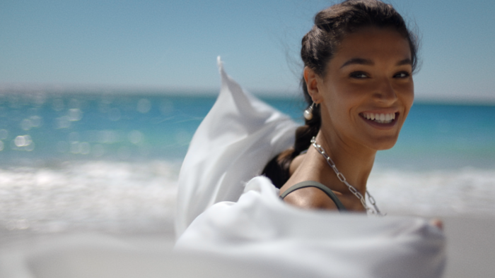 Brisbane Colourist Angela Cerasi colour graded this shot of model/ muse Aude Mangharam wearing statement pieces of Kailis Jewellery as she runs down the beach, for the "RISE Act IV" TVC campaign for Kailis Jewellery