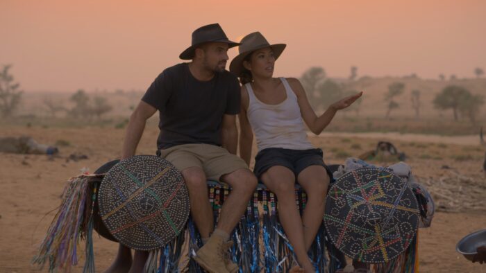 Image of PJ Madam and Tim Noonan from being carried on an elephant for the Netflix TV series "Extreme Engagement" graded by Angela Cerasi