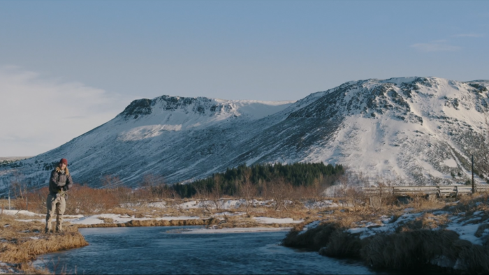 Peachy Keen Colourist Angela Cerasi colour graded this shot of a person standing along in a snowy, mountainous landscape, from the documentary "Trio"